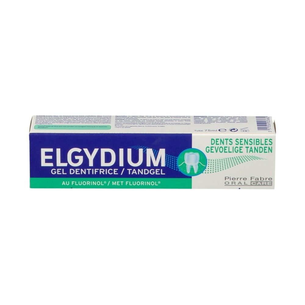 Boîte de gel dentifrice. Texte: ELGYDIUM, Dents sensibles, Pierre Fabre. Vert, bleu, blanc.