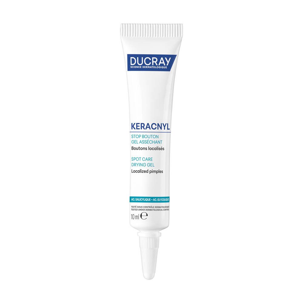 Tube blanc avec nom et informations du produit. Contient 10 ml. Écriture bleue et blanche.