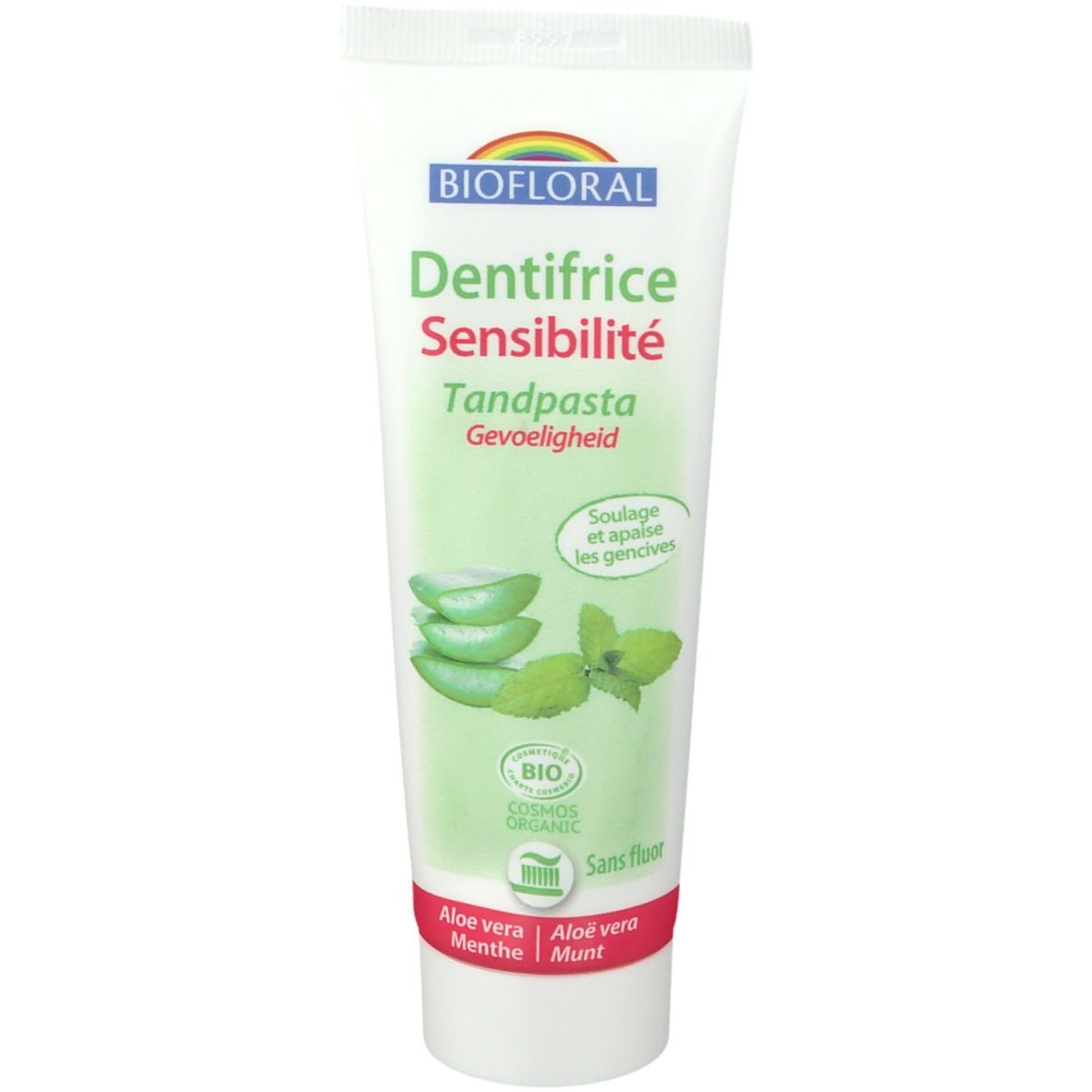 Tube de dentifrice BIOFLORAL, vert et blanc, avec aloe vera et menthe. Texte: Dentifrice Sensibilité, Cosmos Organic.