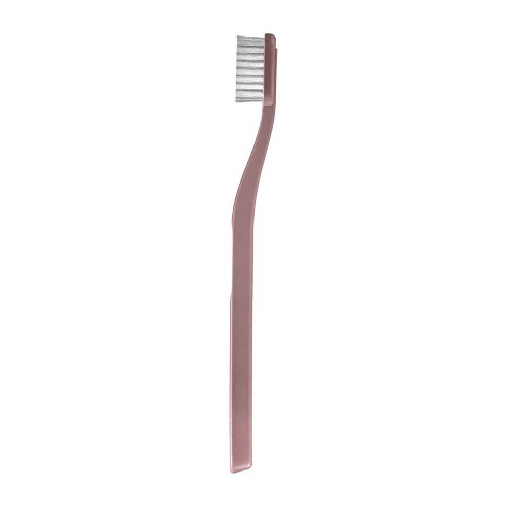 Brosse à dents rose. Tête de brosse à poils blancs. Marque Jordan Green Clean. Extra souple.