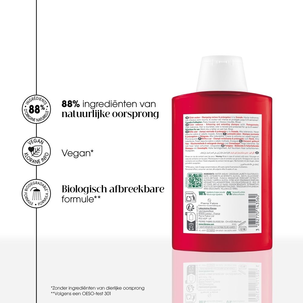 KLORANE Granaatappel shampoo: Fles en tube, met granaatappel illustratie.