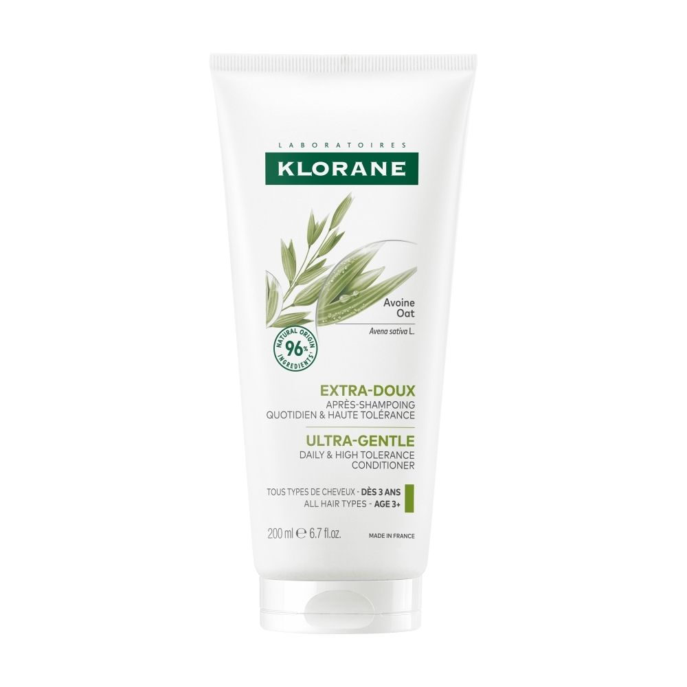 Witte tube Klorane havermelk balsem, voorkant met graanaren-motief, productinformatie en 200ml aanduiding.