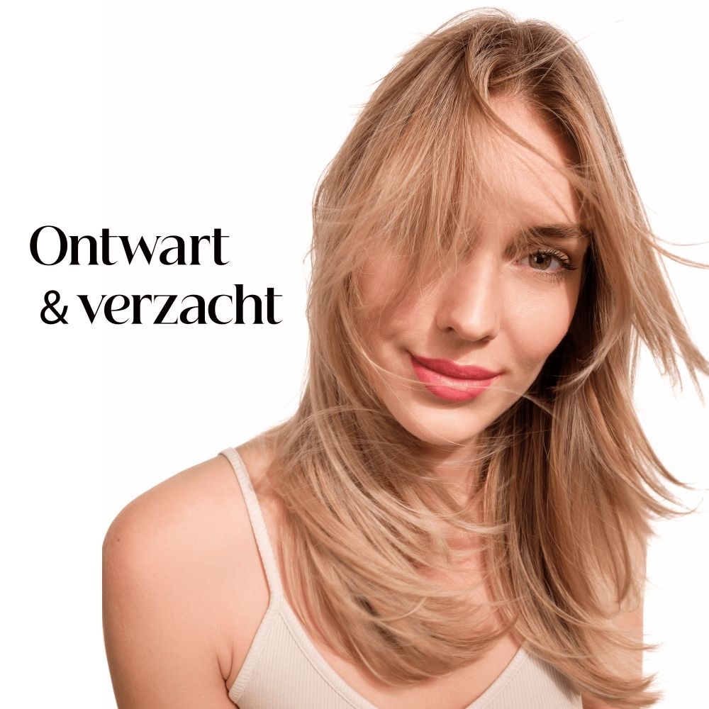 Crèmige textuurstalen van Klorane havermelk balsem met bijschriften over geur en textuur.
