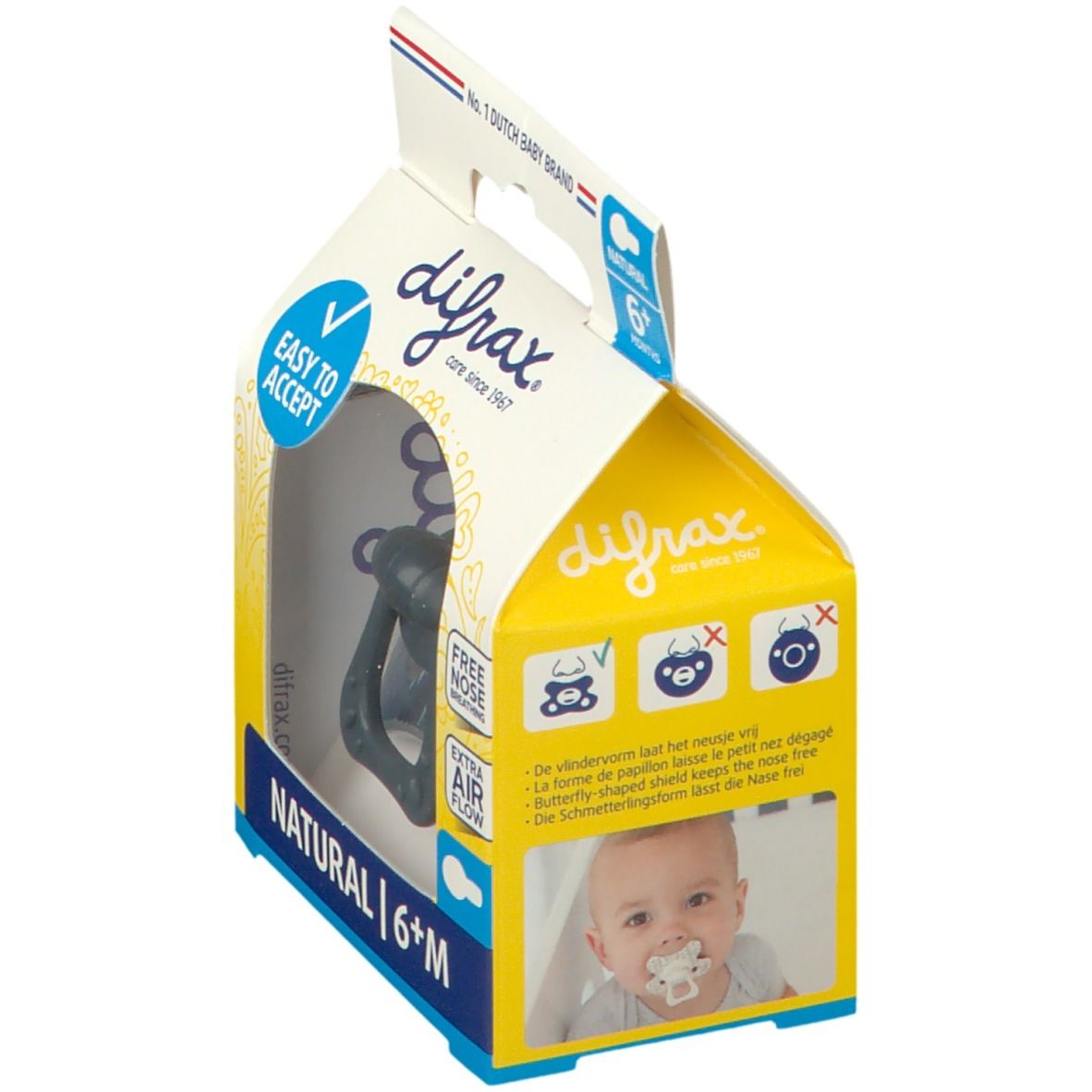 Emballage de sucette. Visible : logo, texte "NATURAL 6+M", "EASY TO ACCEPT", "FREE NOSE BREATHING", "EXTRA AIR FLOW". Bébé avec sucette.