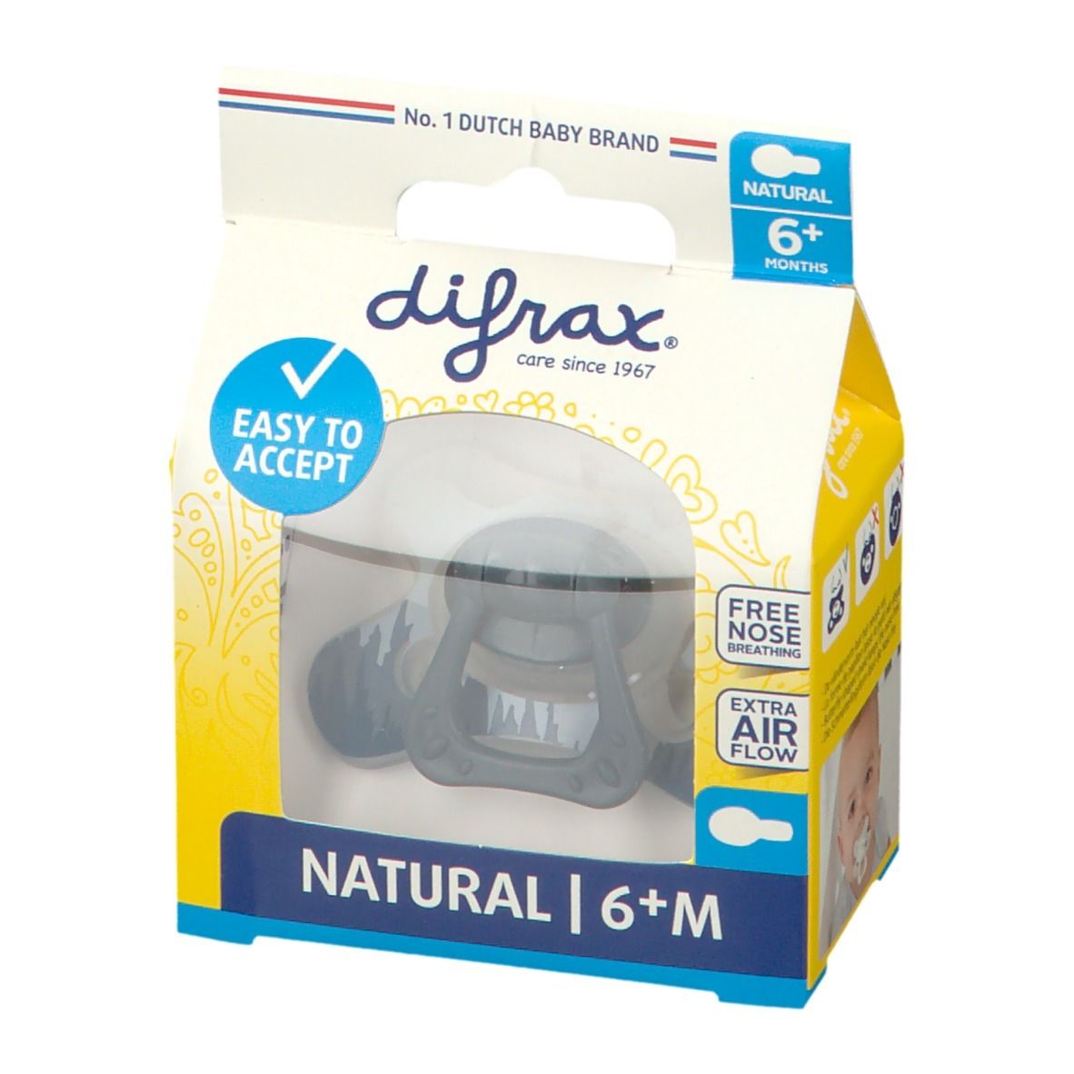 Emballage de sucette. Visible : logo, texte "NATURAL 6+M", "EASY TO ACCEPT", "FREE NOSE BREATHING", "EXTRA AIR FLOW".