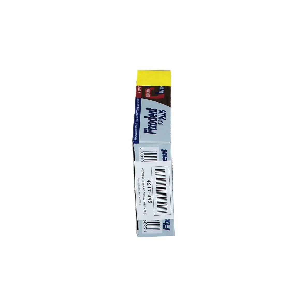 Vue latérale de l'emballage Fixodent Pro Plus. Boîte promotionnelle jaune avec texte et code-barres. Nom et logo visibles.