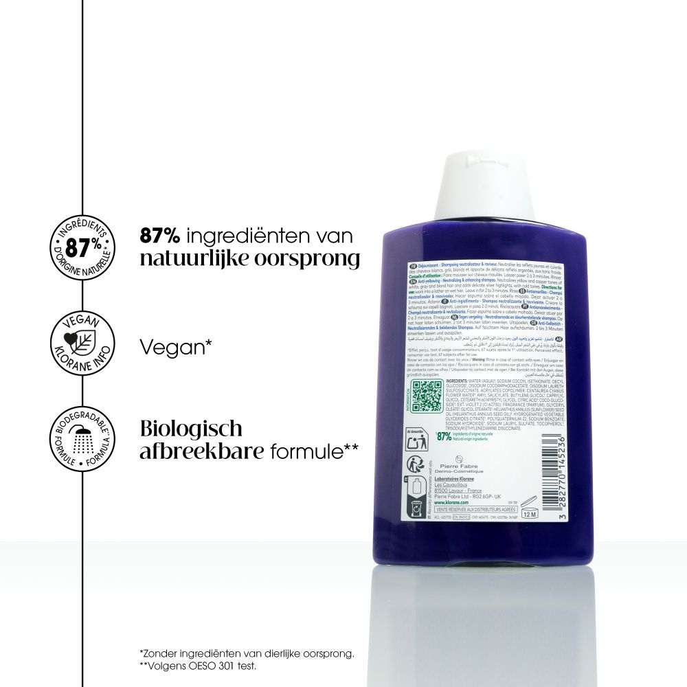 Fles KLORANE Shampoo met Korenbloem BIO. Zegels tonen 87% natuurlijke oorsprong, Vegan, biologisch afbreekbaar.