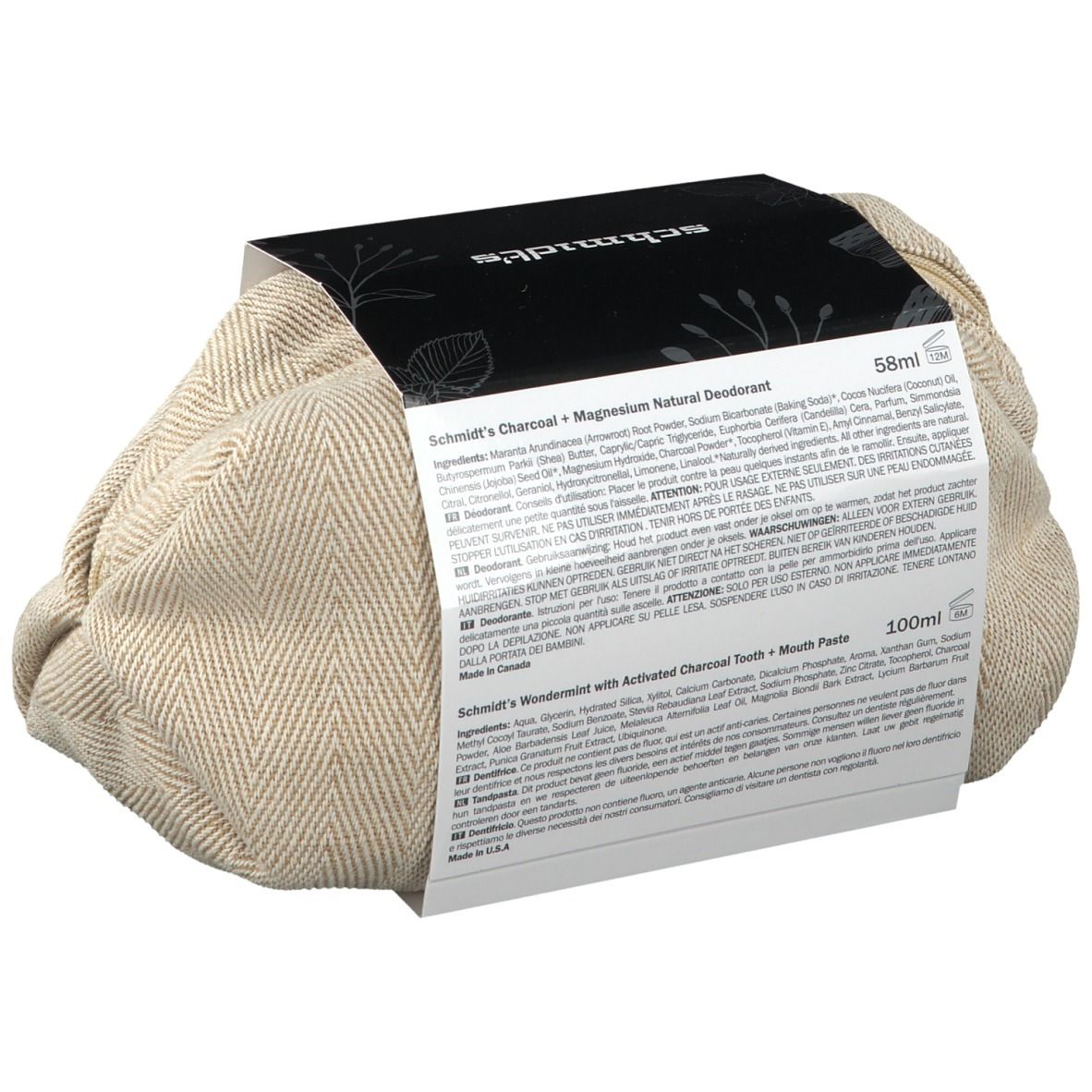 Achterkant van de geschenkset met actieve kool. Bevat informatie over ingrediënten en hoeveelheden. Beige tas.