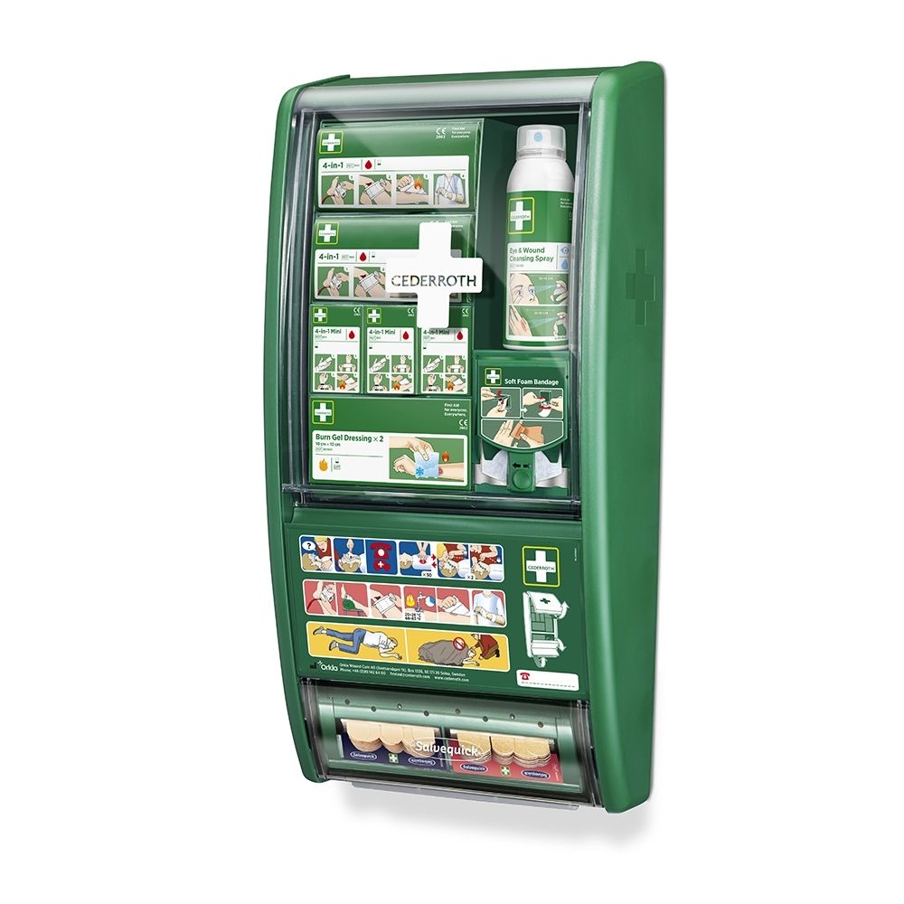 Groen wandkastje voor eerste hulp met transparante klep, gevuld met verbandmiddelen.