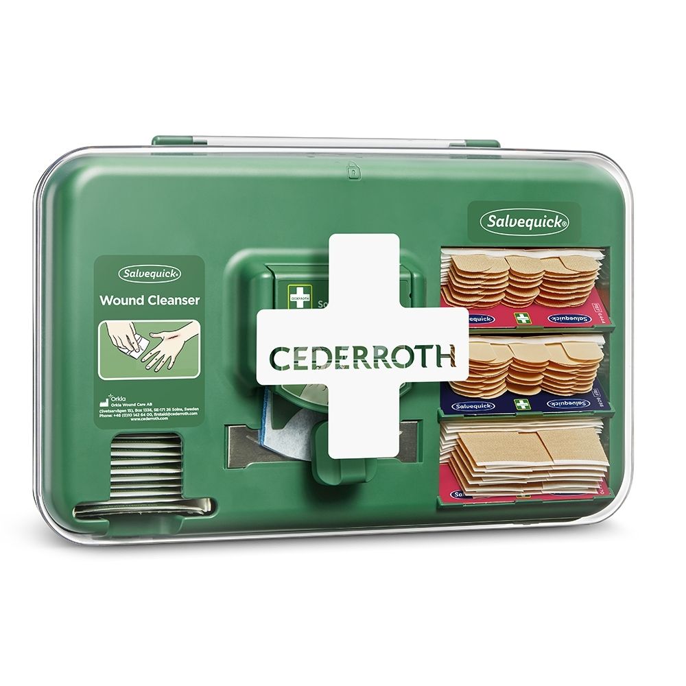 Groene Cederroth Wondverzorgingsdispenser met open deksel, gevuld met verbandmateriaal.
