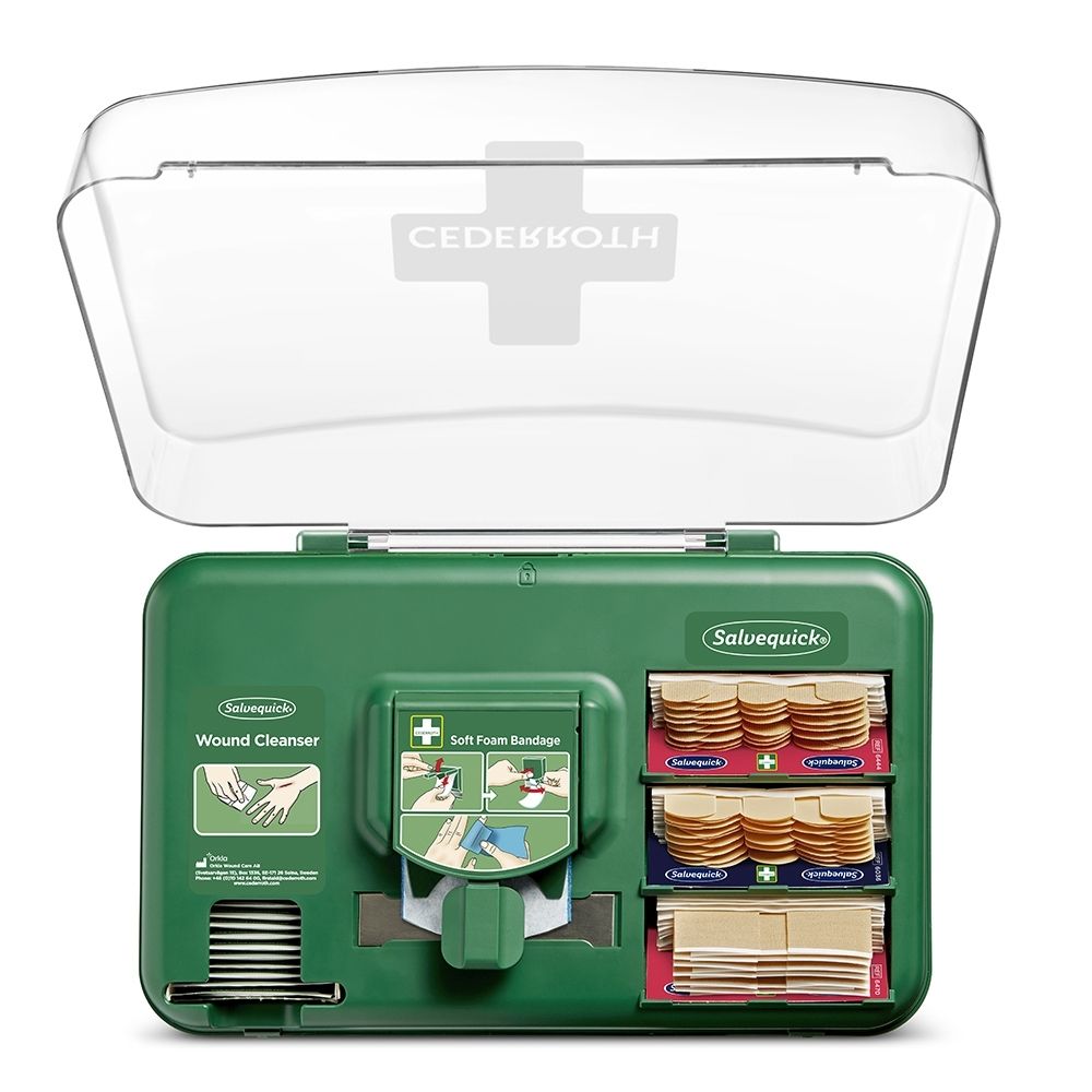Groene Cederroth Wondverzorgingsdispenser met open deksel, gevuld met verbandmateriaal.