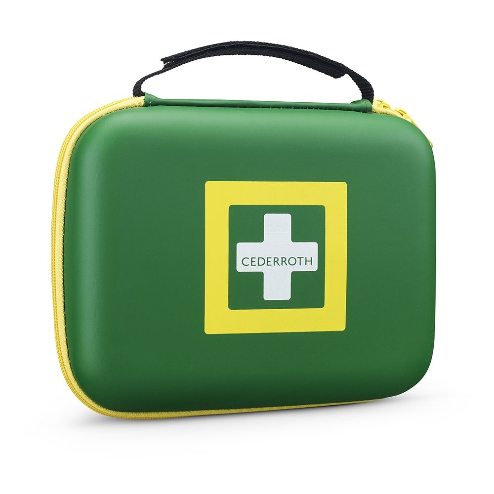 Boîte de premiers secours ouverte avec compartiments, matériel de bandage, ciseaux et pansements. Le contenu est bien organisé.
