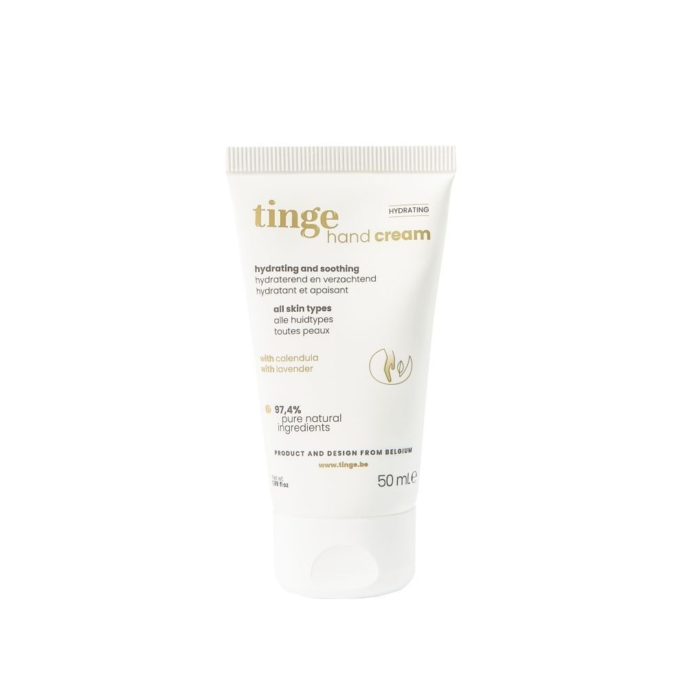 Tinge Handcrème tube met 50ml inhoud, wit met gouden opdruk.