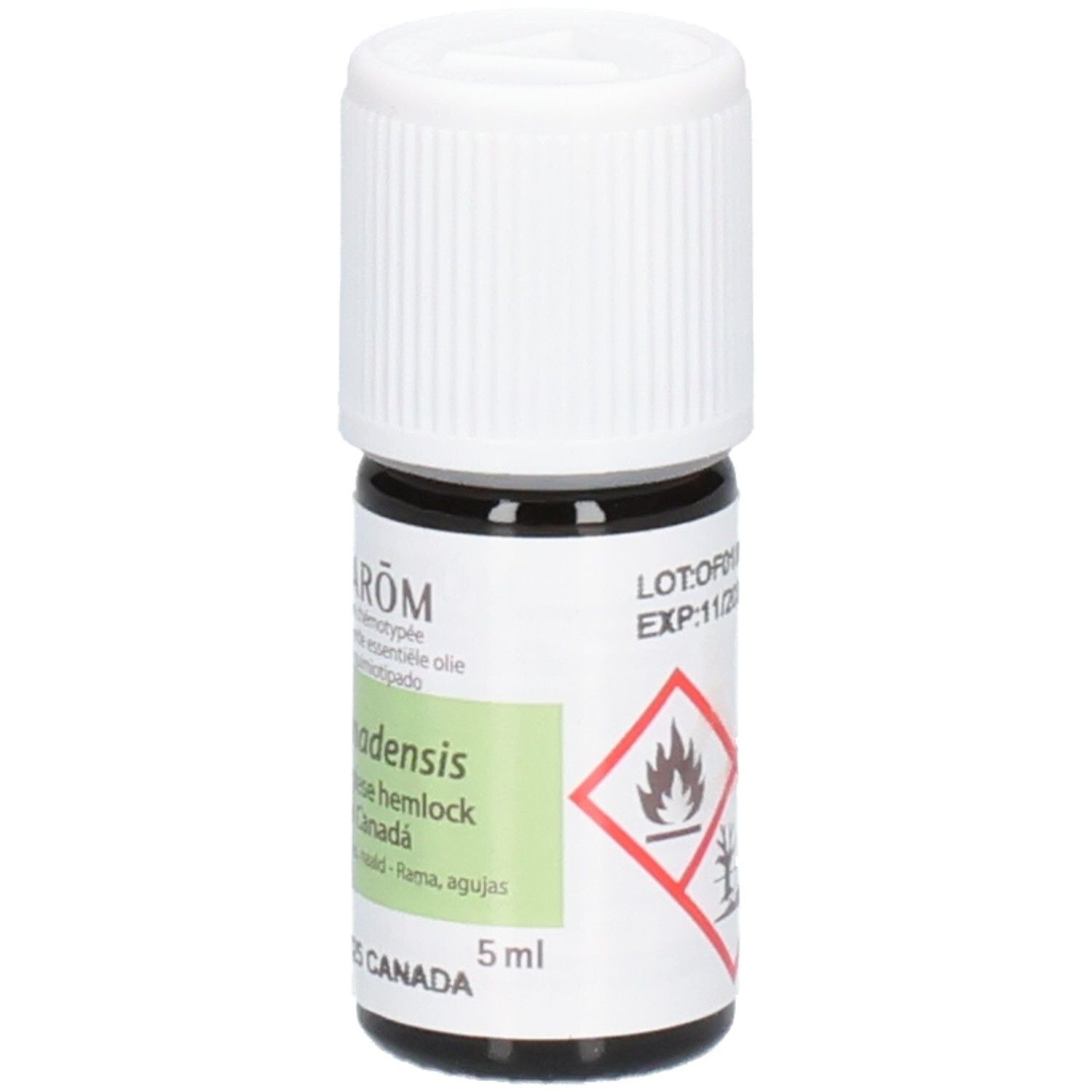 Bruine glazen fles met witte schroefdop, 5ml, etiket 'Aromodensiss', 'Western Hemlock', 'Canada'. Brandbaarheids- en gevaarsymbolen.