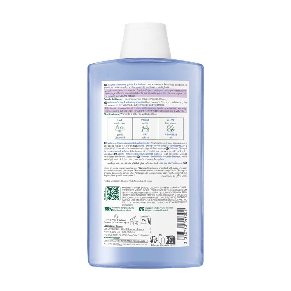 Dos du flacon Klorane Volumenshampoo Flachs. Texte, logos et informations. Liquide bleu visible.