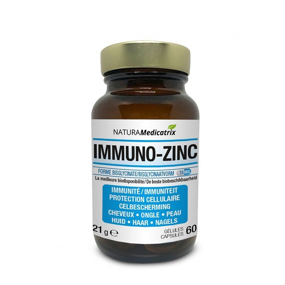 Bruine glazen fles met gouden dop. Opschrift: Natura Medicatrix Immuno-Zinc. Bevat 60 capsules. 21g.
