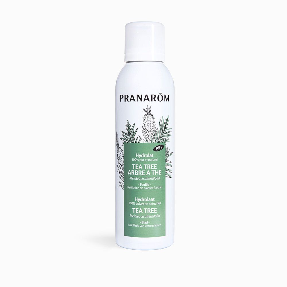Flacon spray blanc avec étiquette verte. Inscription: PRANAROM, Tea Tree, Hydrolat. Certification Bio.