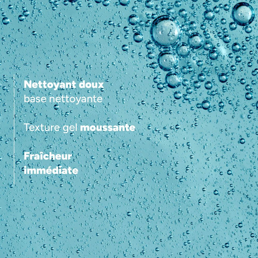 Gros plan sur des bulles d'eau. Texte : Nettoyant doux, texture gel moussante, fraîcheur immédiate.