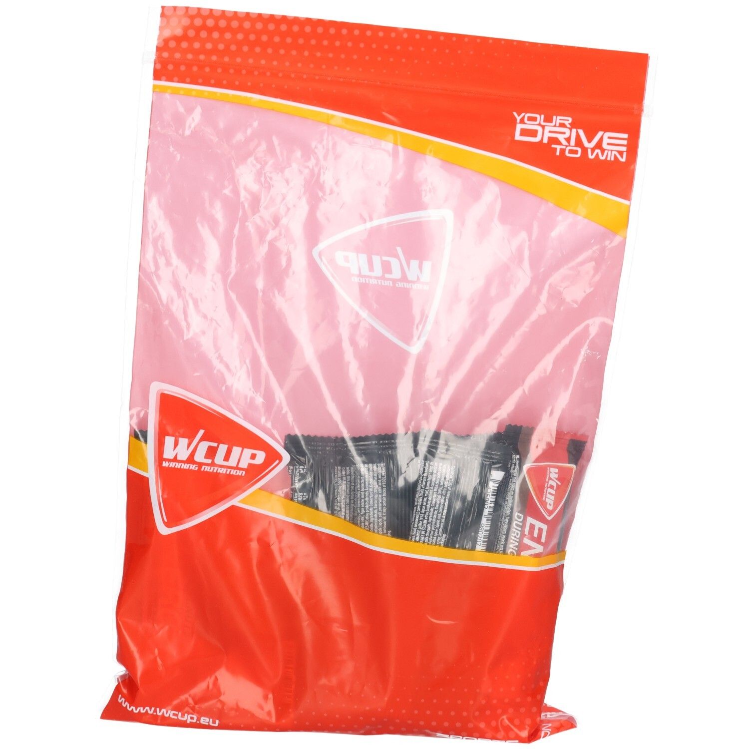 Emballage transparent contenant des barres énergétiques. Emballage rouge avec logo Wcup blanc et texte. Barres visibles en sachet noir.