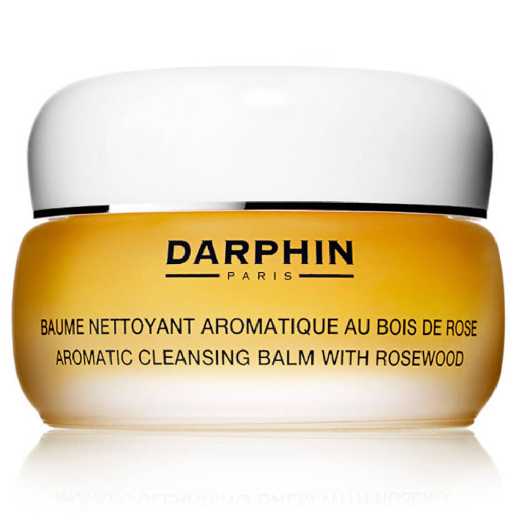 Geelgouden pot met witte deksel. Opschrift DARPHIN PARIS. Productnaam: BAUME NETTOYANT AROMATIQUE AU BOIS DE ROSE.