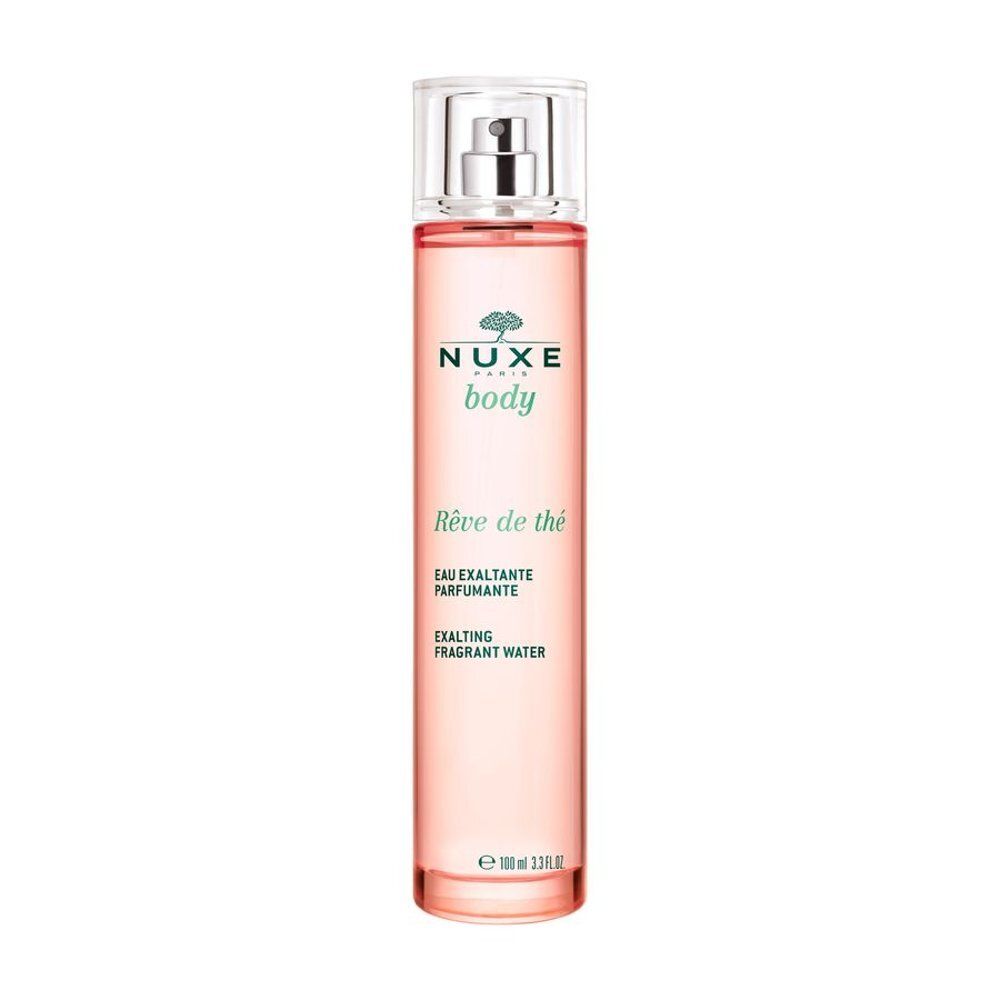 Flacon cylindrique avec vaporisateur. Inscription: NUXE body, Rêve de thé, Eau exaltante parfumante, Exalting fragrant water.