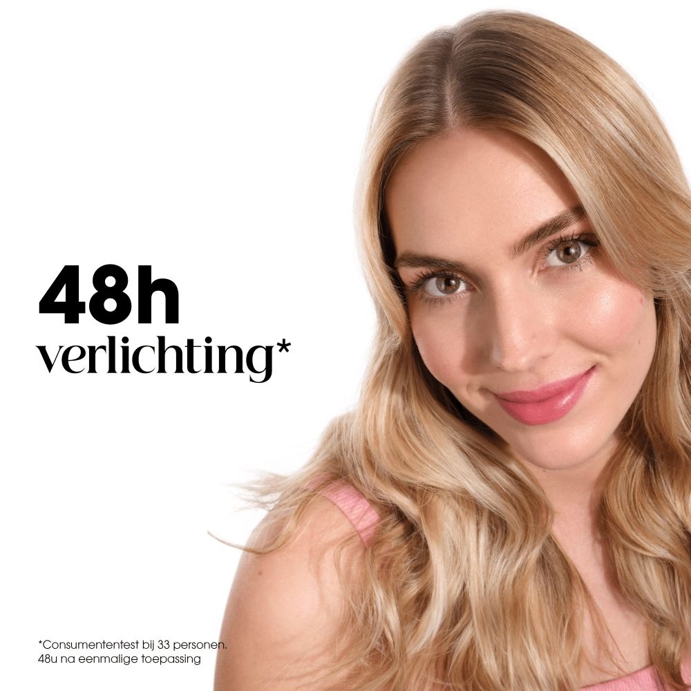 Vrouw met glanzend haar, 48u kalmering voor de hoofdhuid.