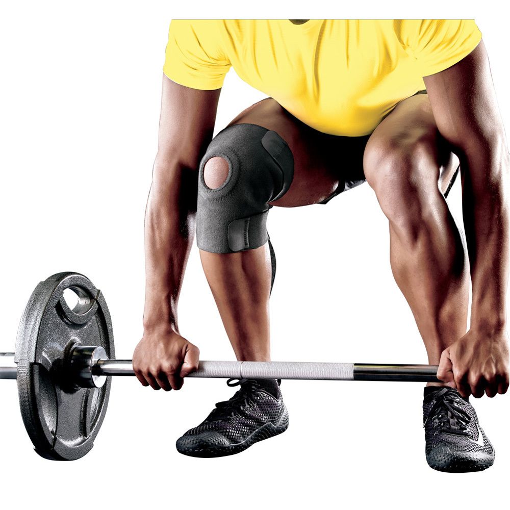 FUTURO kniebandage, grijs. Verpakking met productafbeelding en meertalige tekst.