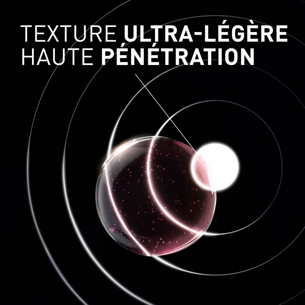 Flacon rose avec pipette. Liquide qui coule. Inscription: FILORGA, NCEF-SHOT, concentré.