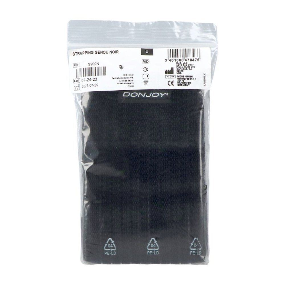 Genouillère noire dans un emballage plastique. Marque DONJOY. Texte : STRAPPING GENOU NOIR. Marquage CE.