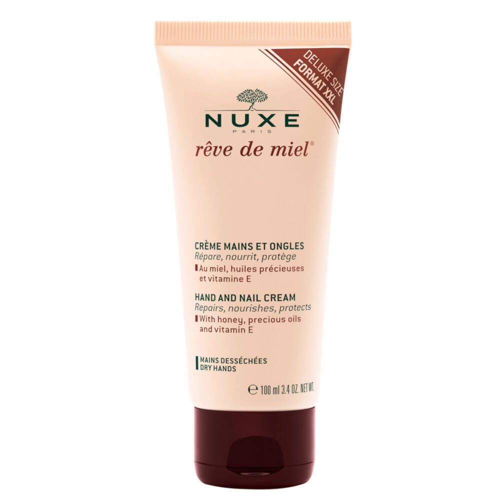 Hand- en nagelcrème in tube. Beige tube met bruine dop. Tekst: NUXE Rêve de Miel, Crème Mains et Ongles, Hand and Nail Cream.