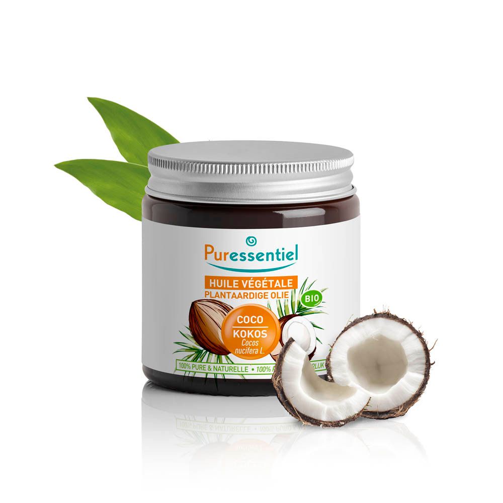 Pot en verre avec noix de coco et feuilles. Nom du produit et label bio visibles.