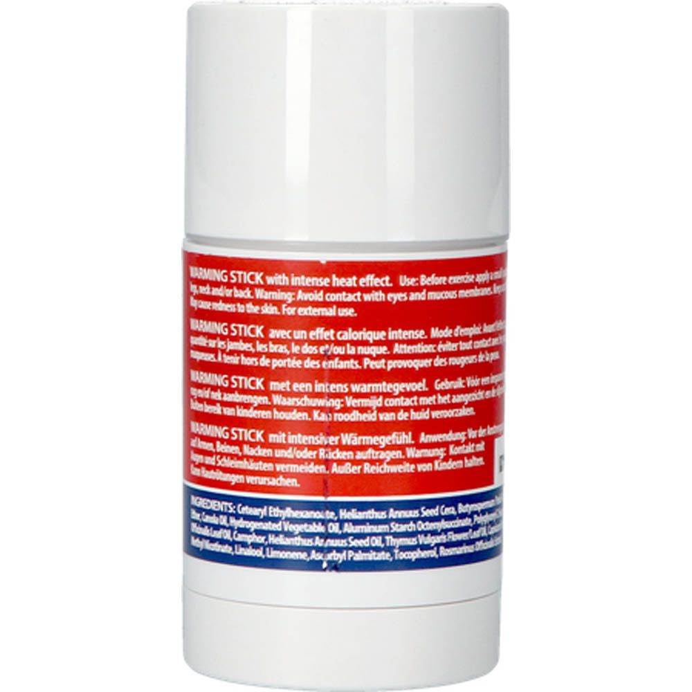 Witte cilindrische stick. Achterkant met tekst in meerdere talen. Ingrediënten en gebruiksaanwijzing.