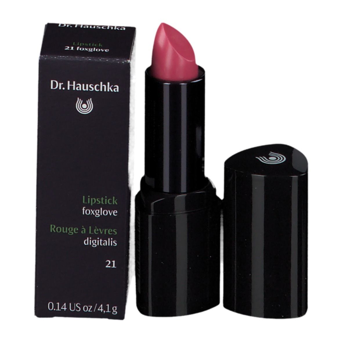Lippenstift met verpakking. Zwarte huls, roze punt. Tekst: Dr. Hauschka, Lipstick 21 foxglove.