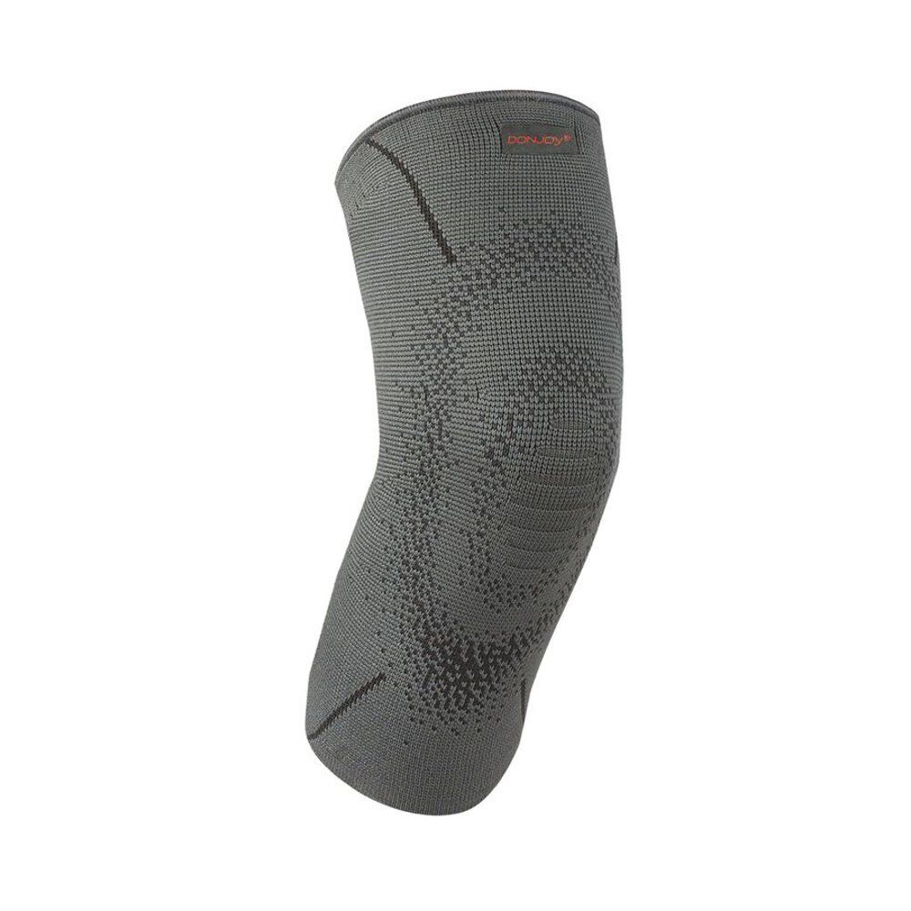 Grijze kniebrace. Elastisch materiaal met ingeweven patronen. Merk DonJoy zichtbaar. Extra Extra Large.