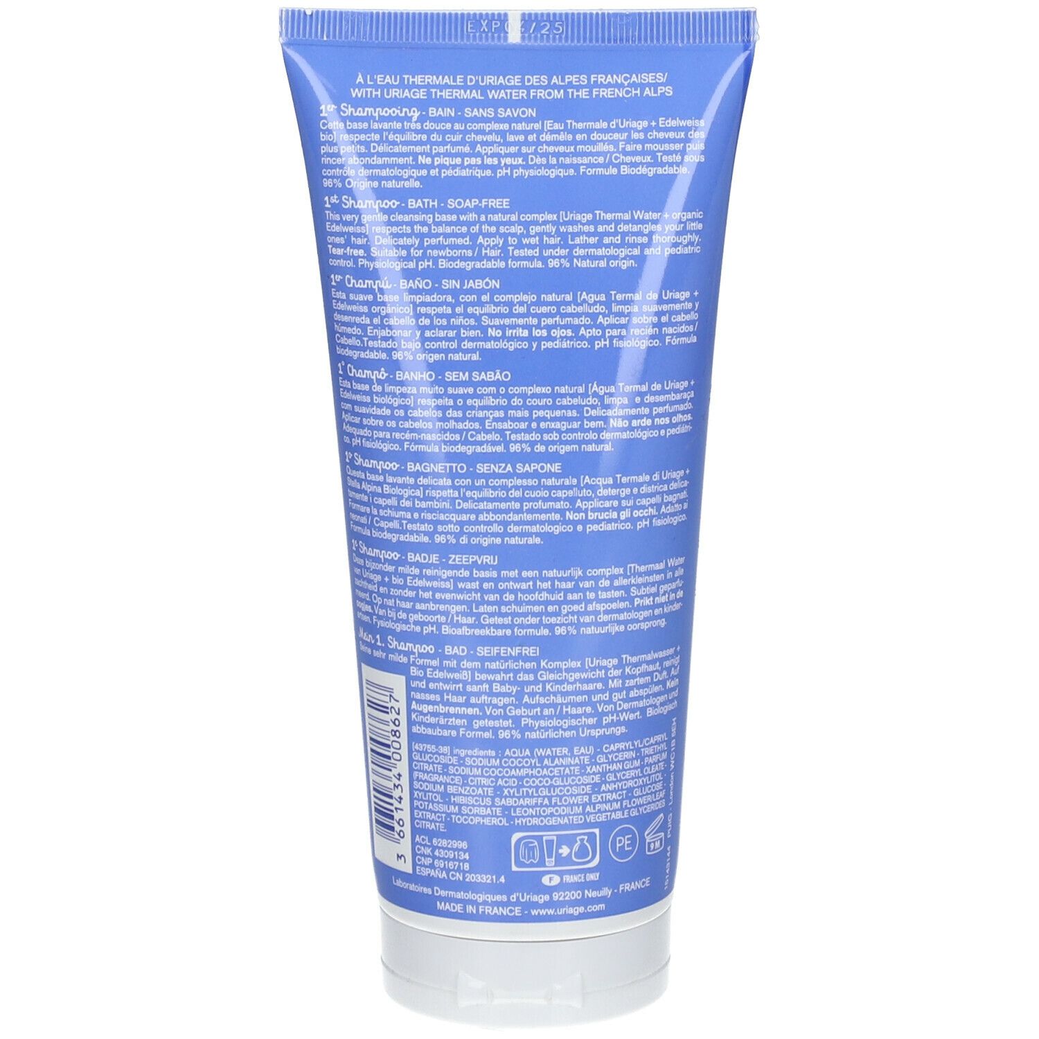 Achterkant van de blauwe tube. Meertalige tekst, waaronder "1er Shampooing" en informatie over ingrediënten en certificeringen.