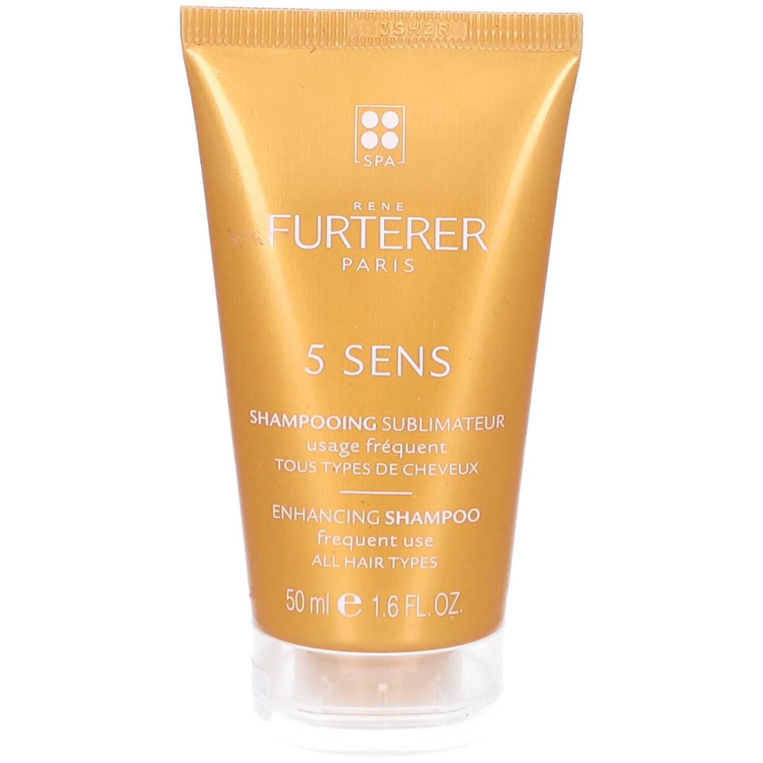 Gouden tube met merklogo en naam. Tekst: 5 SENS, Shampooing Sublimateur, Enhancing Shampoo. Transparante dop.