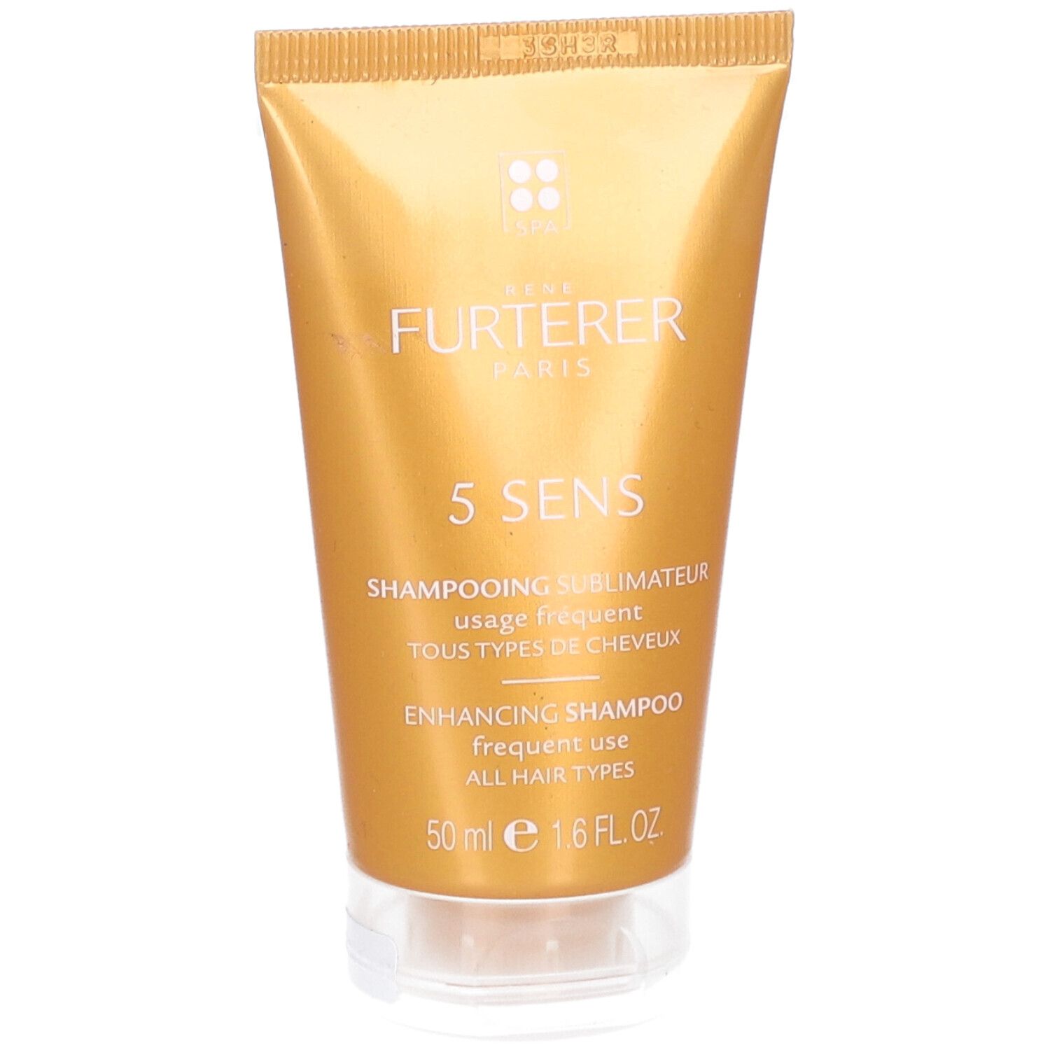Gouden tube met merklogo en naam. Tekst: 5 SENS, Shampooing Sublimateur, Enhancing Shampoo. Transparante dop.