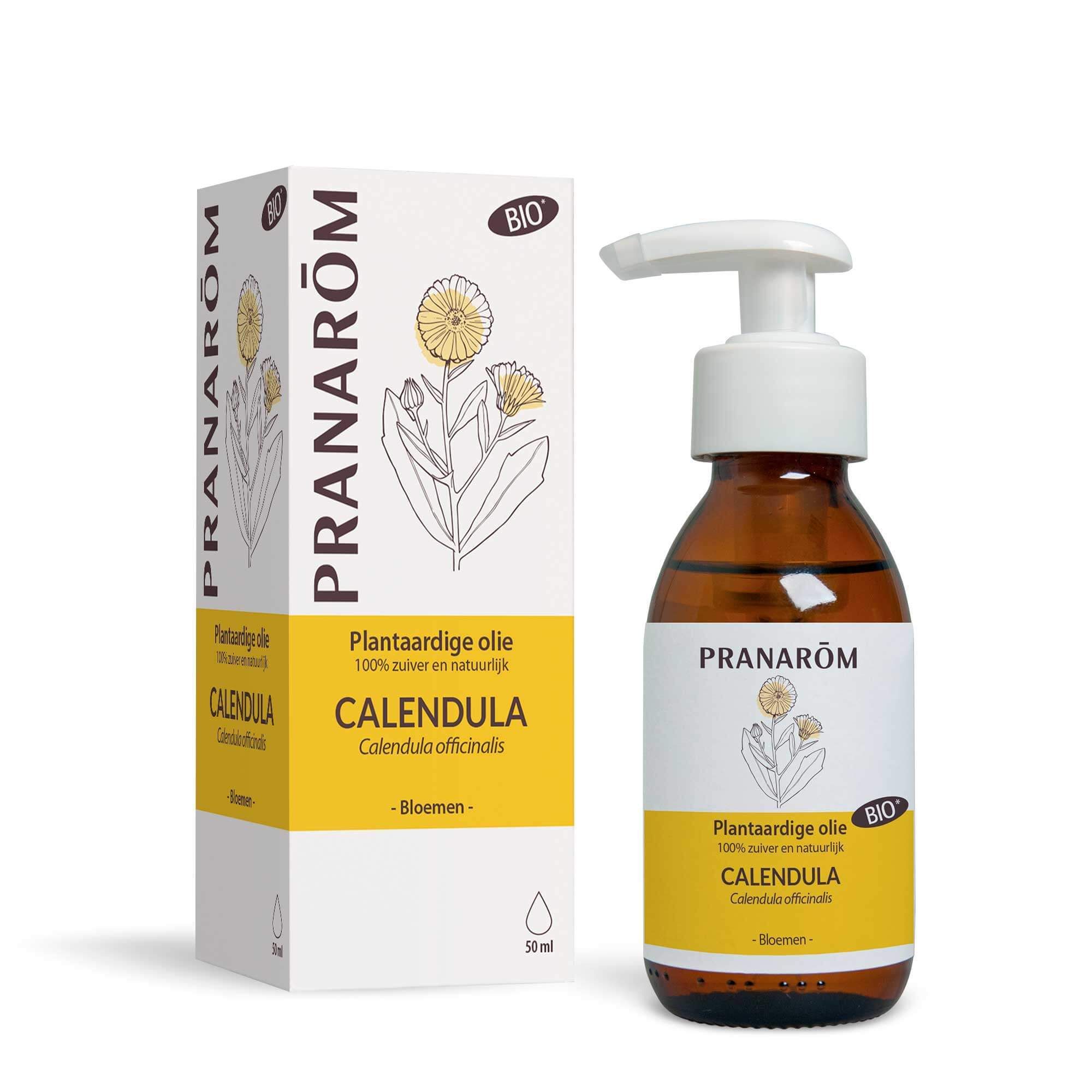 Bruine glazen fles met pomp. Etiket met tekst en logo. Product: Calendula.