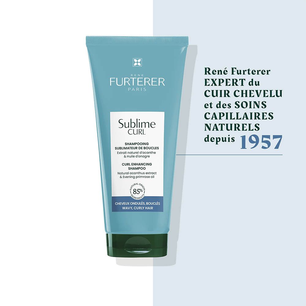 Tube de shampooing Sublime Curl René Furterer turquoise avec bouchon foncé.