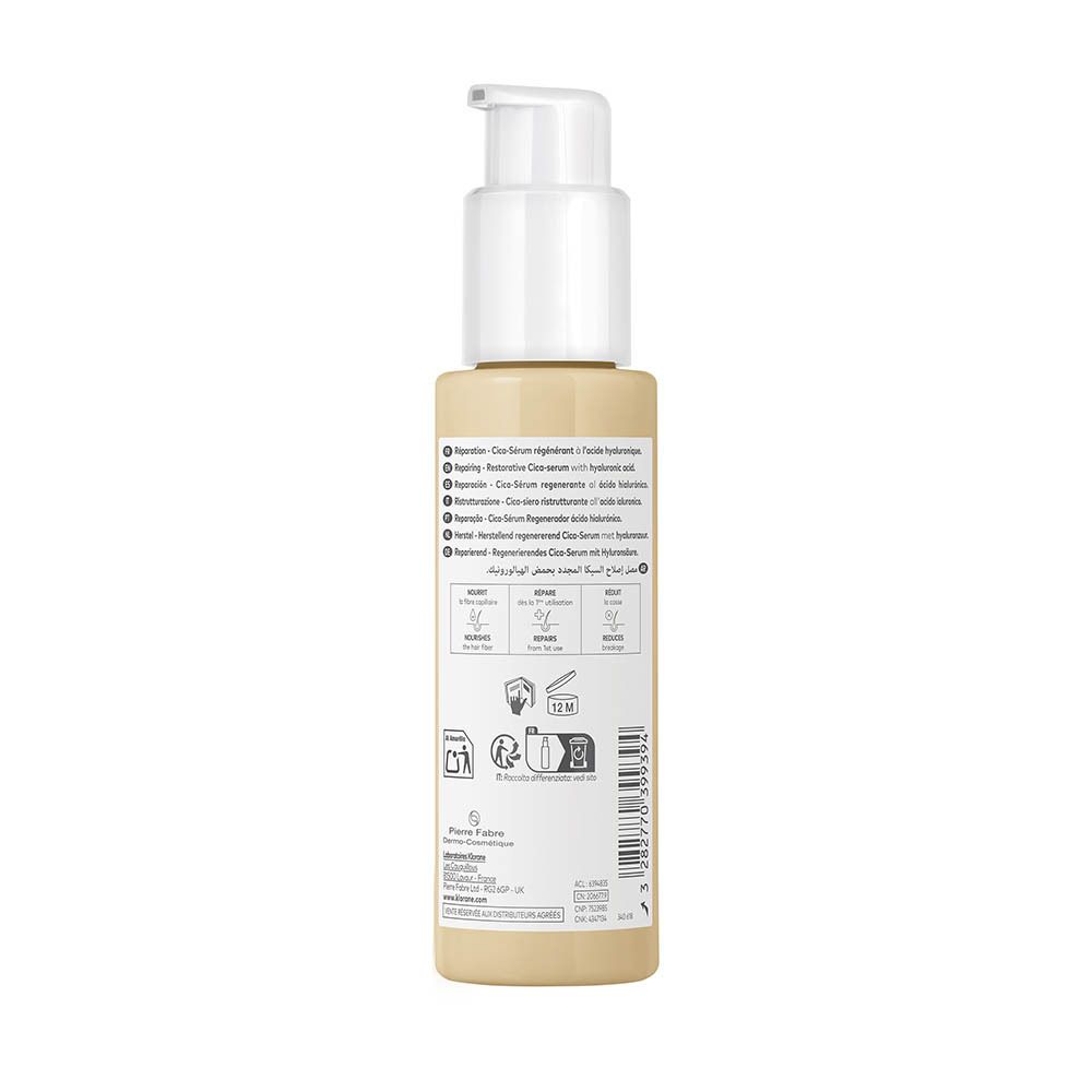 Beige fles met witte pompdispenser, achterkant met gebruiksinstructies.