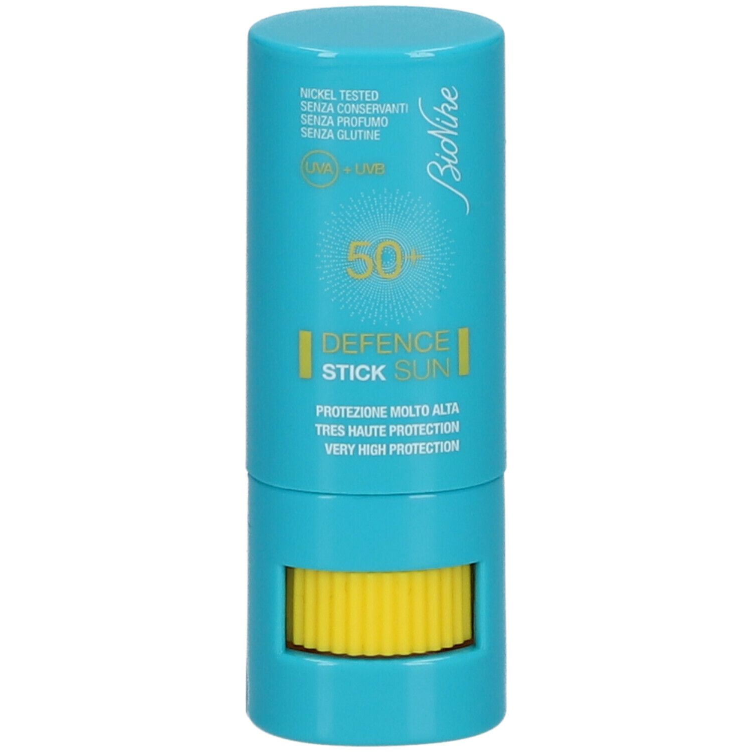 Blauwe stick met gele draaimechanisme. Opschrift: BioNike, DEFENCE SUN, 50+. Bevat informatie over bescherming en ingrediënten.