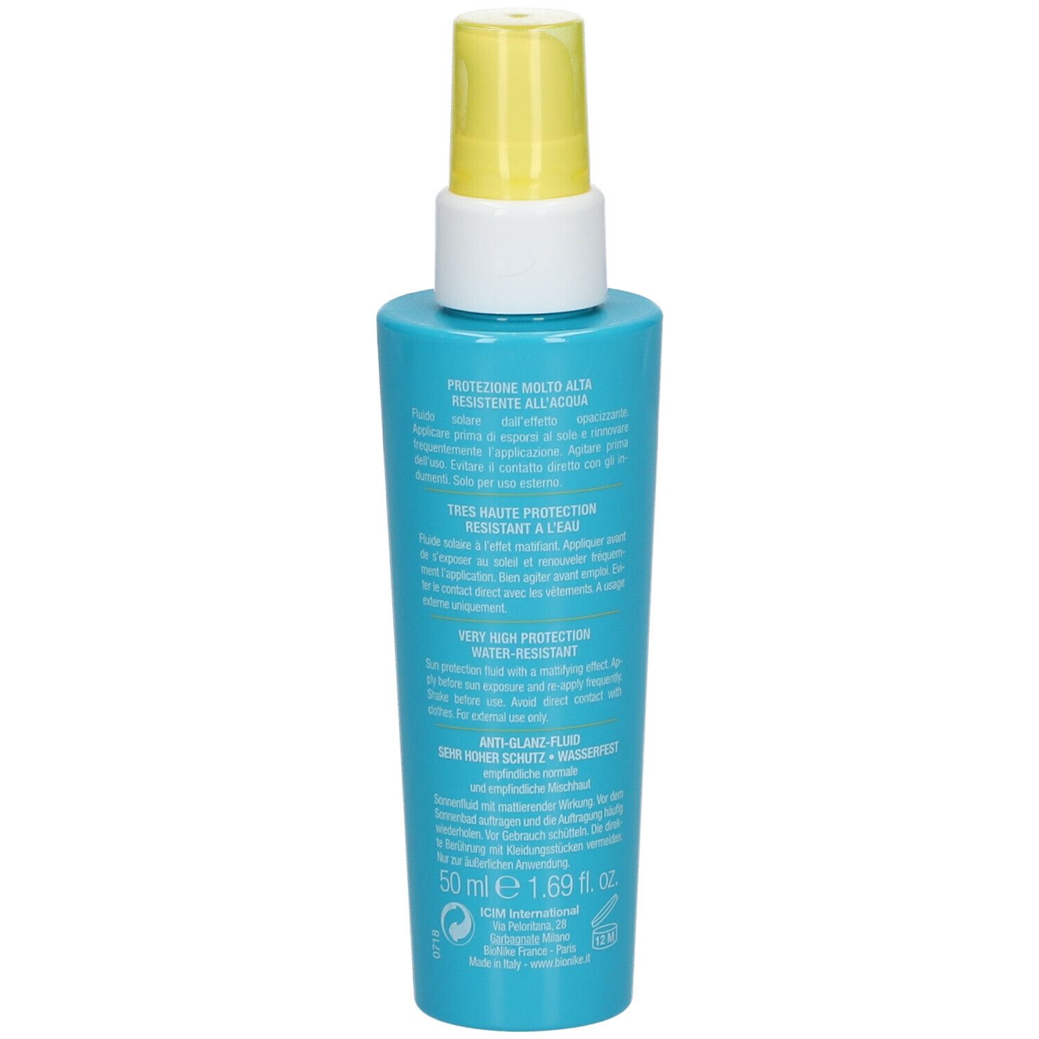Turquoise fles met gele spraykop. Achterkant met meertalige tekst, waaronder '50 ml'.