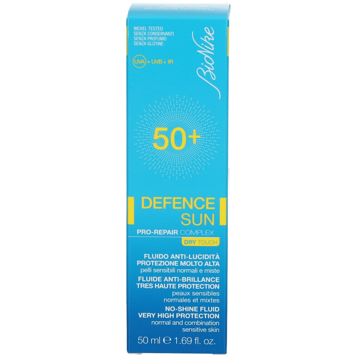 Turquoise doos. Opschrift: Bionike, 50+, Defence Sun, Fluido Anti-Lucidità. Met '50 ml'.