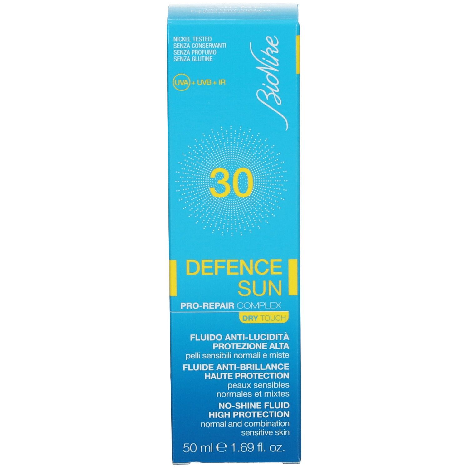 Emballage du produit. Bleu turquoise, jaune et blanc. Inscription : BioNike, SPF 30, DEFENCE SUN, fluide anti-brillance.