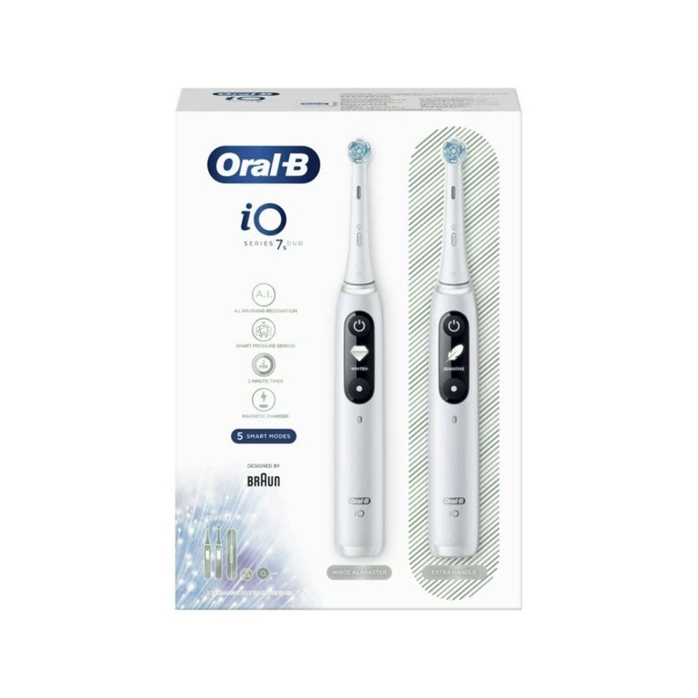 Emballage avec deux brosses à dents électriques blanches. Marque Oral-B iO, Série 7. Accessoires inclus.