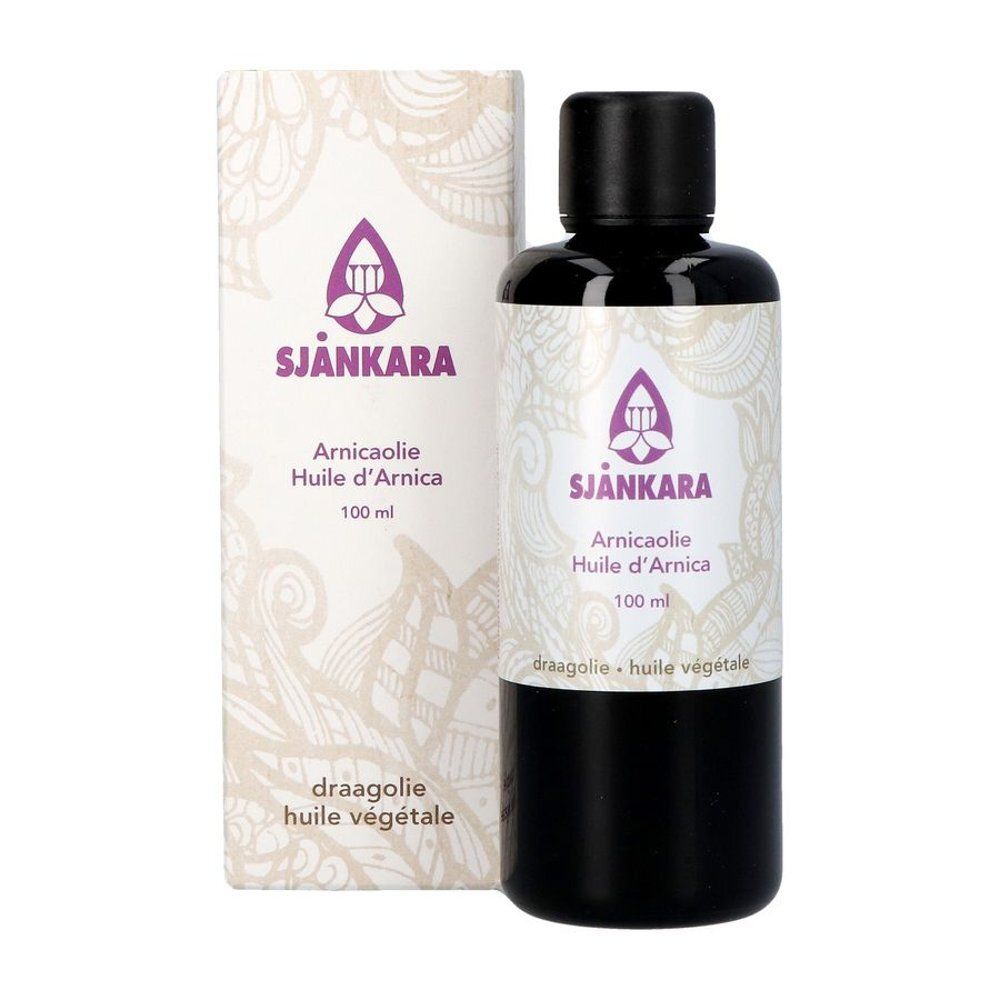 Productfles en verpakking. Fles bruin, dop zwart. Verpakking wit met logo.