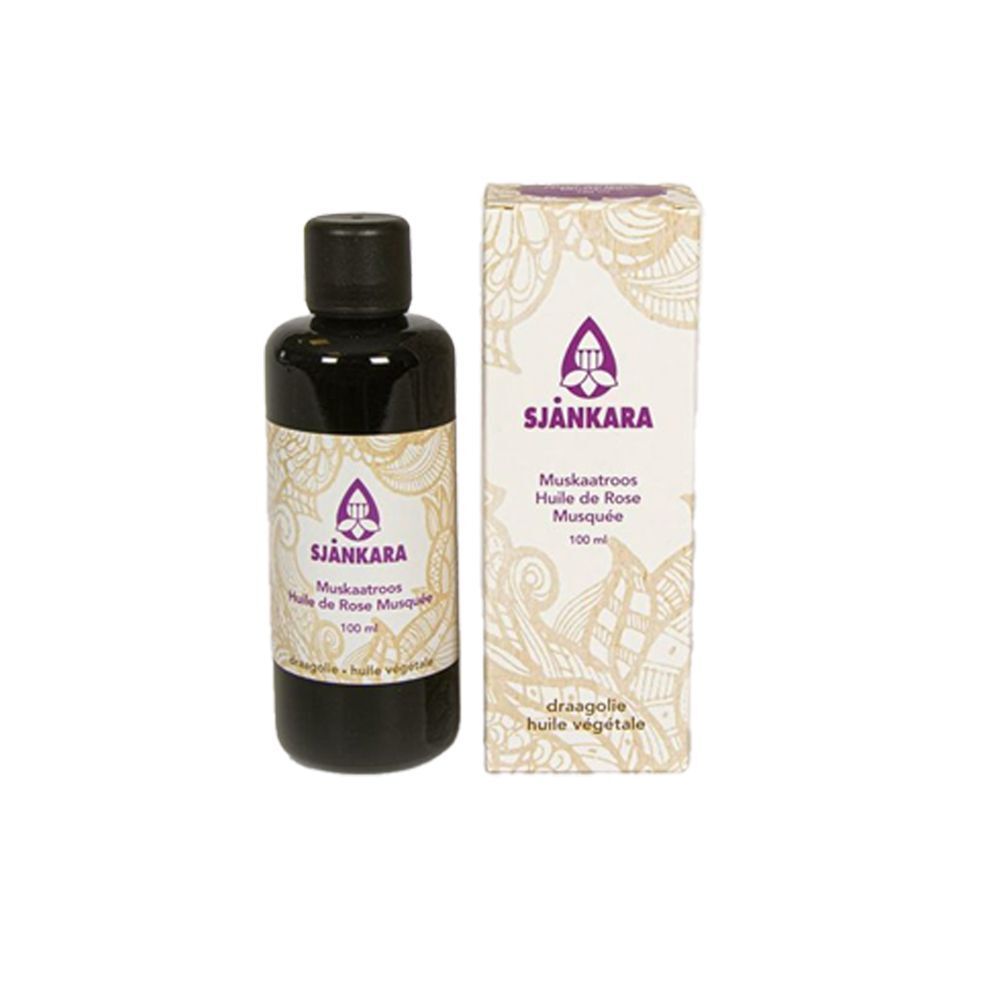 Flacon et emballage du produit. Flacon brun avec bouchon noir. Emballage blanc.