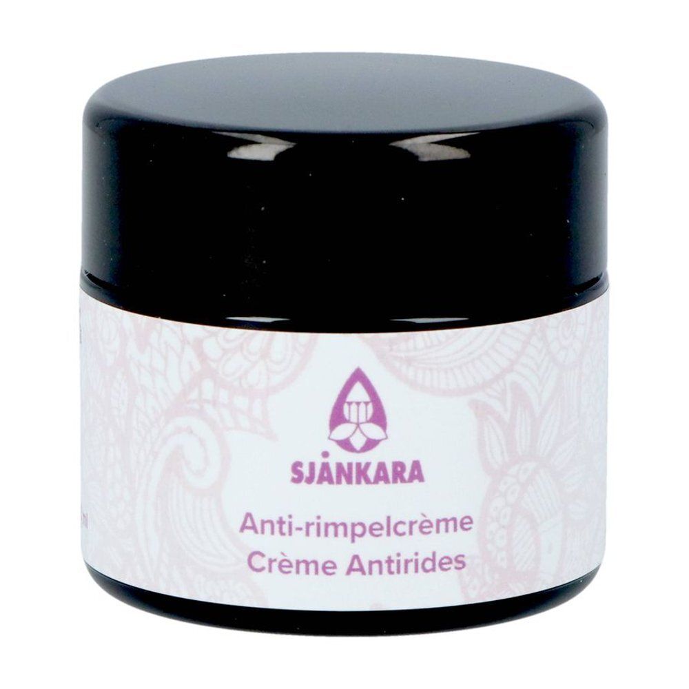 Crèmepot met zwarte deksel. Etiket met logo, tekst: Anti-rimpelcrème, Crème Antirides.