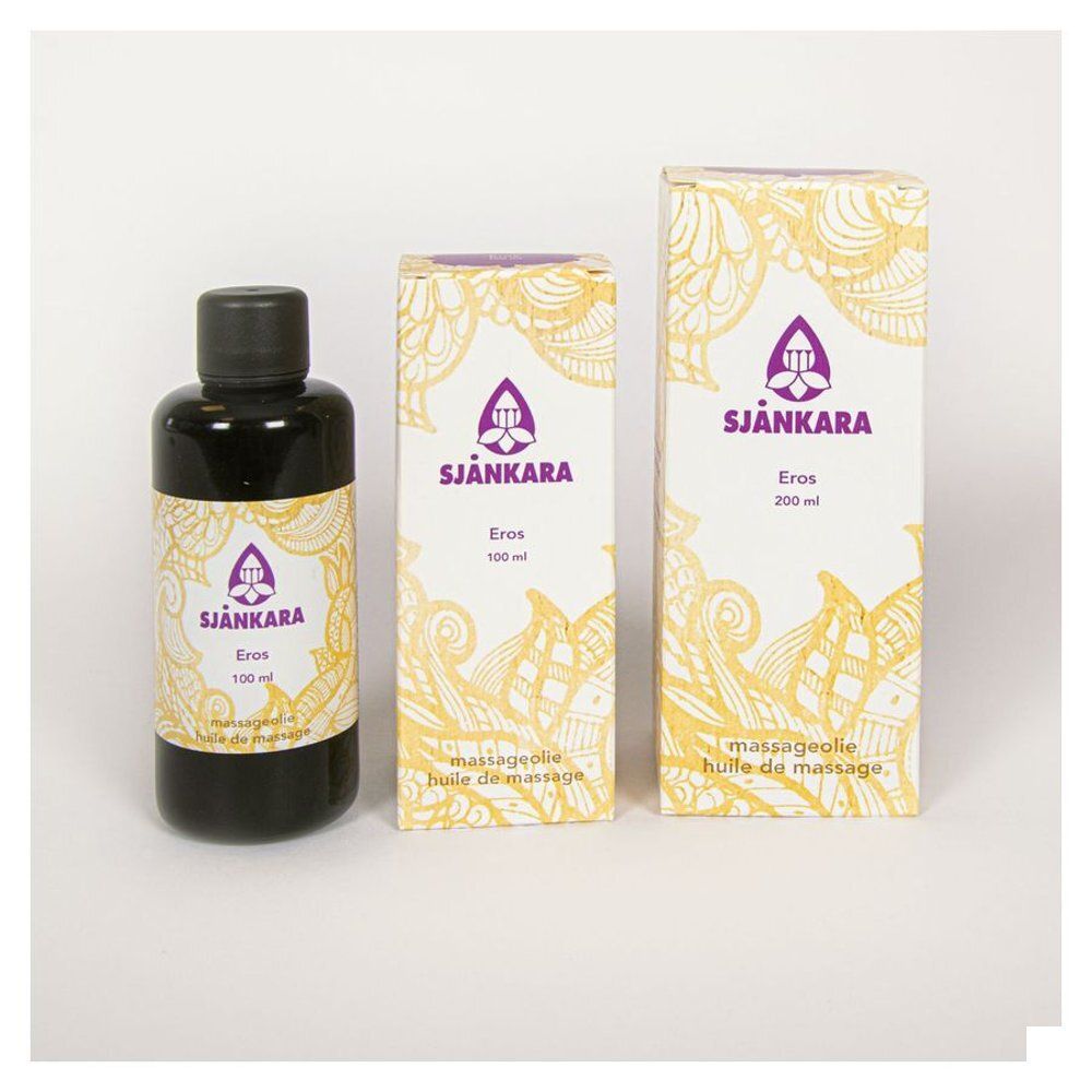Trois contenants : une bouteille et deux boîtes. Inscriptions : Sjankara, Eros, huile de massage. Emballage à motifs floraux.