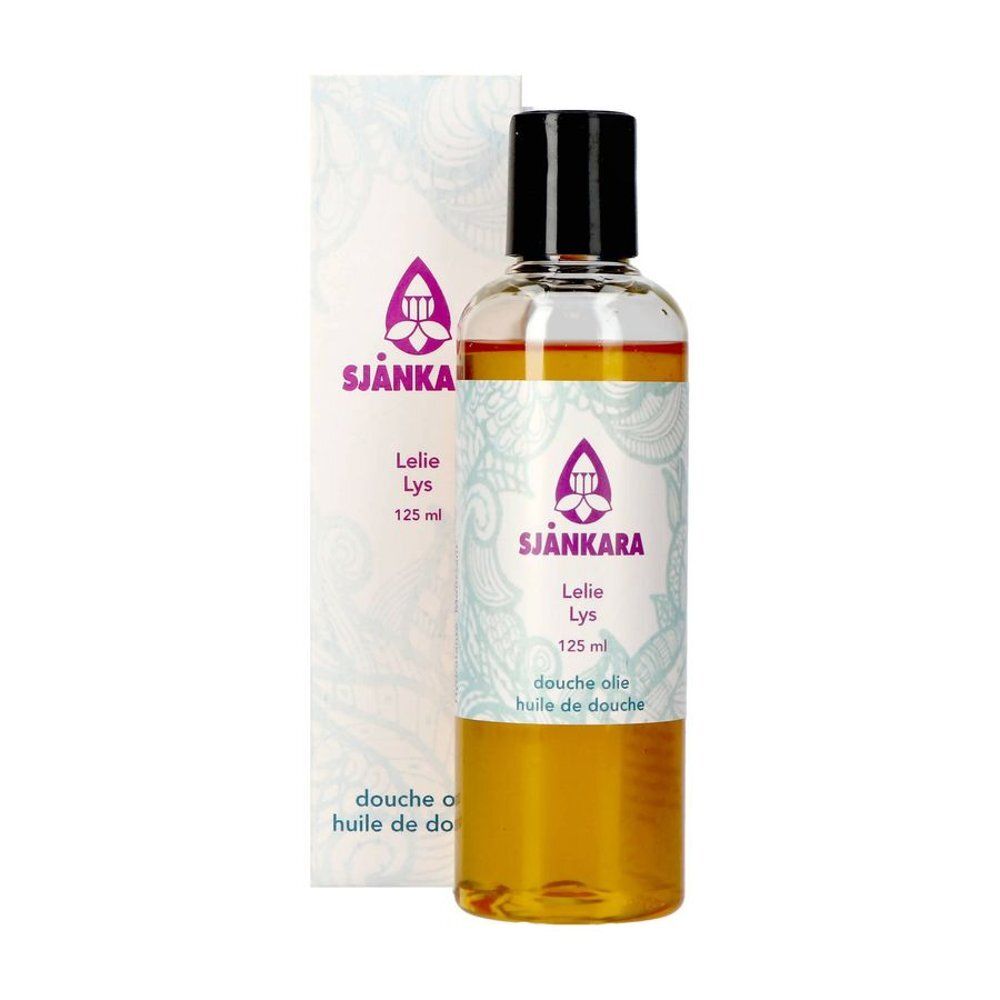 Flacon et emballage Sjankara Huile de Douche au Lys. Flacon transparent avec bouchon noir, liquide jaune et étiquette. Emballage avec logo et texte.